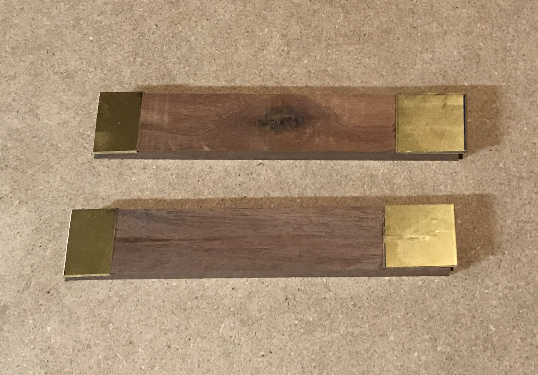 The handles with rabbets cut and brass in place